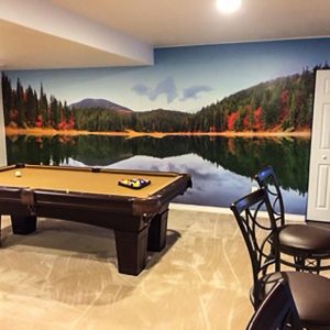 By not having any furniture directly in front of this Autumn Mountain Lake mural, it makes it seem as if you could take a dip in between shots.