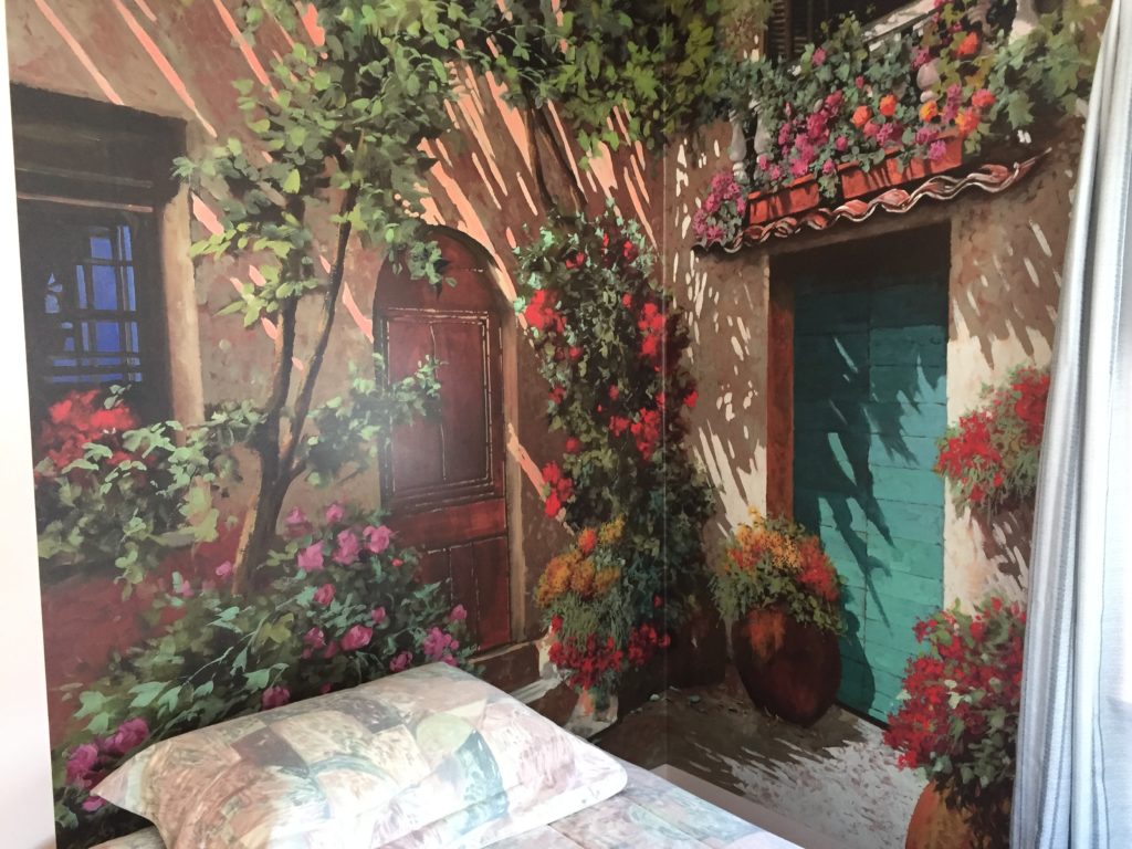 Colorful Italian Wall Mural Creates 3D Effect