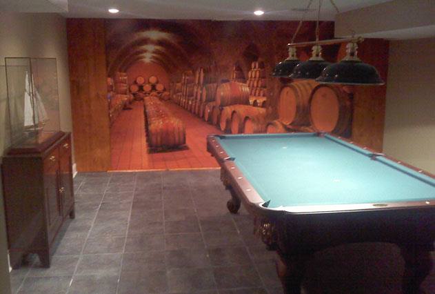 It's not just landscapes that can open up the space of an underground man cave. The grand depth of this wine cellar wall mural makes it seem as if you'd chase that ball forever if it jumped off the table.