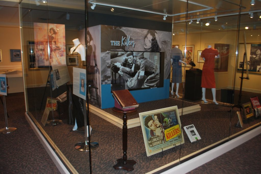 Adhesive graphics cover the video monitor in the main display case at the Ava Gardner Museum.