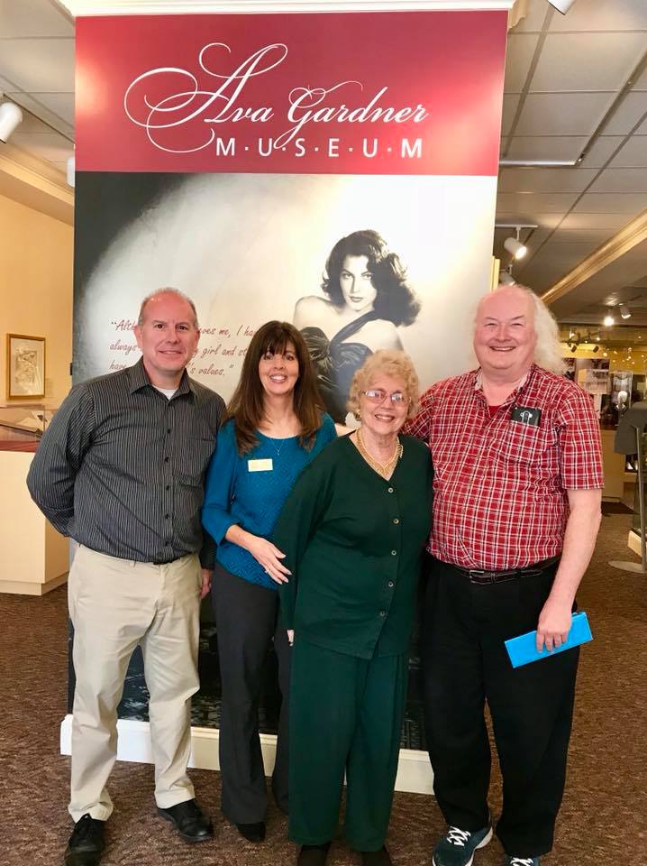 Museum Director Lynell Seabold takes some time to take a shot with some visitors.