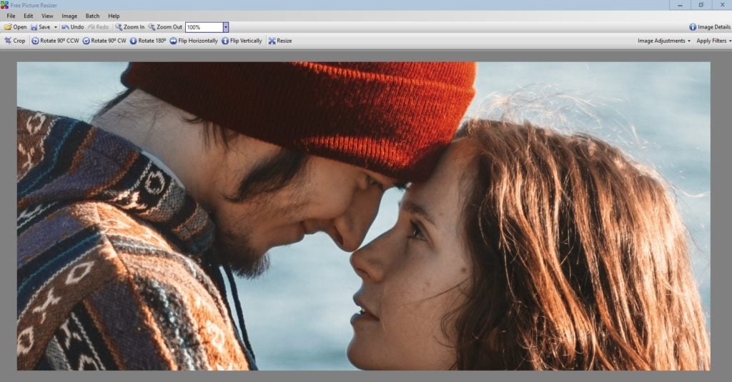 By changing from “Fit To Screen,” to “100%,” we can see the details of the image in the size we want to print. Nice looking couple. Very natural.