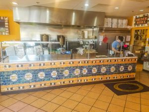 The Mediterranean Sandwich Company stores feature beautiful tile decorations... that are actually wall murals!