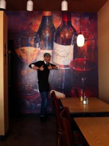 We grabbed this shot right off of social media. Cristo's Pizza has nailed how to provide the perfect selfie background with this wine bottle wall mural. We wouldn't be surprised if it increases bottle sales too!