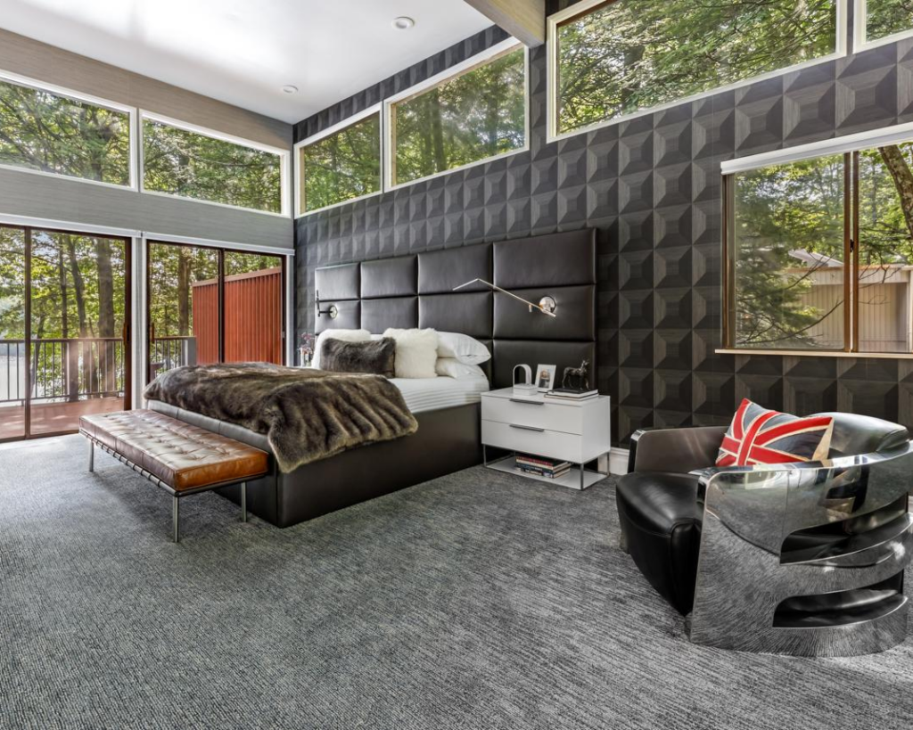 We're also loving the wall treatment in this master bedroom.