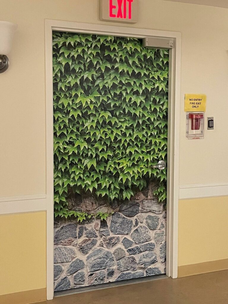 The images chosen for these door covers include barriers such as fences and walls